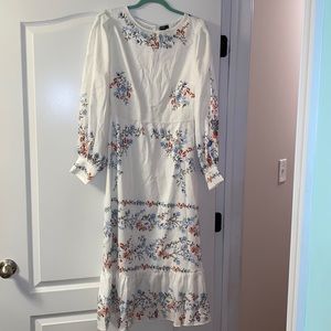 Lantern sleeve, ruffle hem floral dress